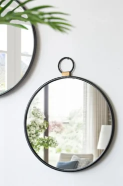Kirkland's Home Black Metal Frame Round Loop Wall Mirror- Decorative Mirrors