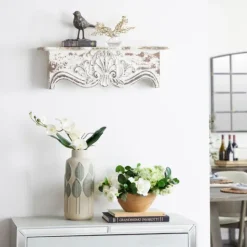 Kirkland's Home Brown Distressed Carved Wood Wall Shelf- Shelves