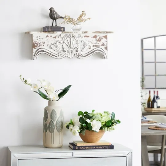 Kirkland's Home Brown Distressed Carved Wood Wall Shelf- Shelves
