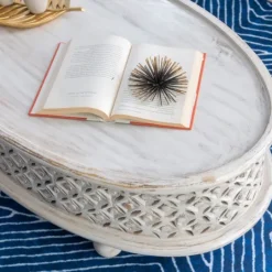 Kirkland's Home Carved Lattice Wood Oval Coffee Table- Coffee Tables