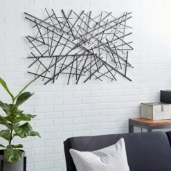 Kirkland's Home Dark Metal Abstract Scattered Wall Sculpture- Wall Plaques