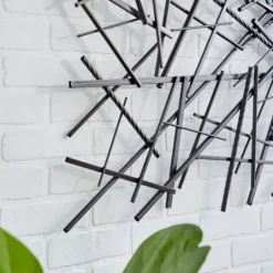 Kirkland's Home Dark Metal Abstract Scattered Wall Sculpture- Wall Plaques