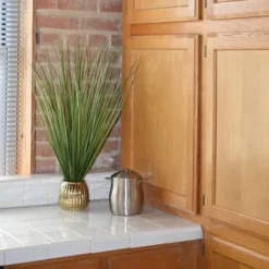 Kirkland's Home Grass Arrangement In Gold Ribbed Pot- Arrangements & Greenery
