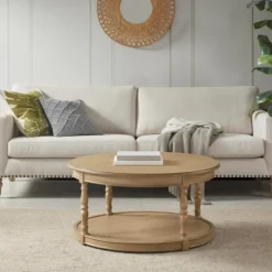 Kirkland's Home Natural Wood Finish Turned Leg Round Coffee Table- Coffee Tables
