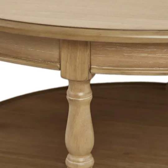 Kirkland's Home Natural Wood Finish Turned Leg Round Coffee Table- Coffee Tables