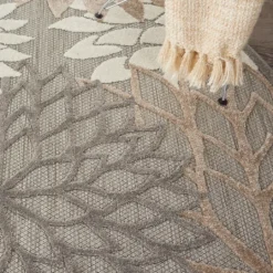 Kirkland's Home Neutral Floral Burst Outdoor Round Area Rug, 5 Ft.- Outdoor Rugs