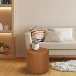 Kirkland's Home Newton Carmel Faux Leather Cylinder Ottoman- Benches & Ottomans