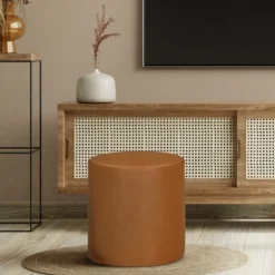 Kirkland's Home Newton Carmel Faux Leather Cylinder Ottoman- Benches & Ottomans