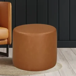 Kirkland's Home Newton Carmel Faux Leather Cylinder Ottoman- Benches & Ottomans