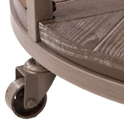 Kirkland's Home Round Kona Rolling Coffee Table- Coffee Tables