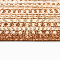 Kirkland's Home Rust Linear Macy Indoor/Outdoor Area Rug, 4X7- Outdoor Rugs