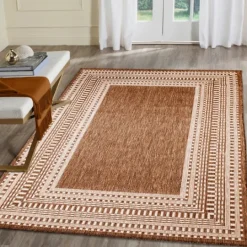 Kirkland's Home Rust Linear Macy Indoor/Outdoor Area Rug, 7X9- Outdoor Rugs