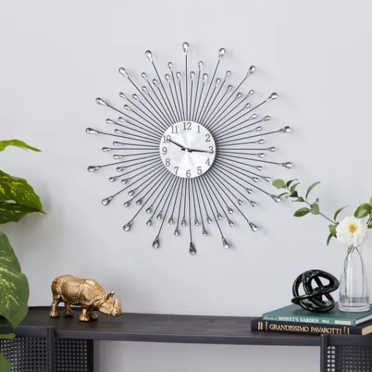 Kirkland's Home Silver Metal Sunburst Droplet Frame Clock- Clocks