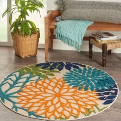 Kirkland's Home Tangerine Floral Burst Round Outdoor Area Rug- Outdoor Rugs