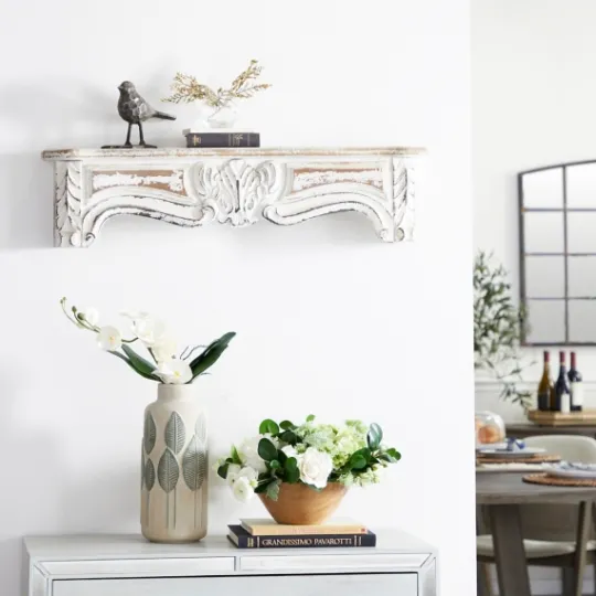 Kirkland's Home White Distressed Carved Wood Acanthus Wall Shelf- Shelves
