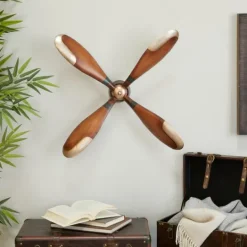 Kirkland's Home Wright Brass Airplane Propeller Wall Plaque- Wall Plaques